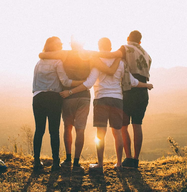 friends watching the sunrise together